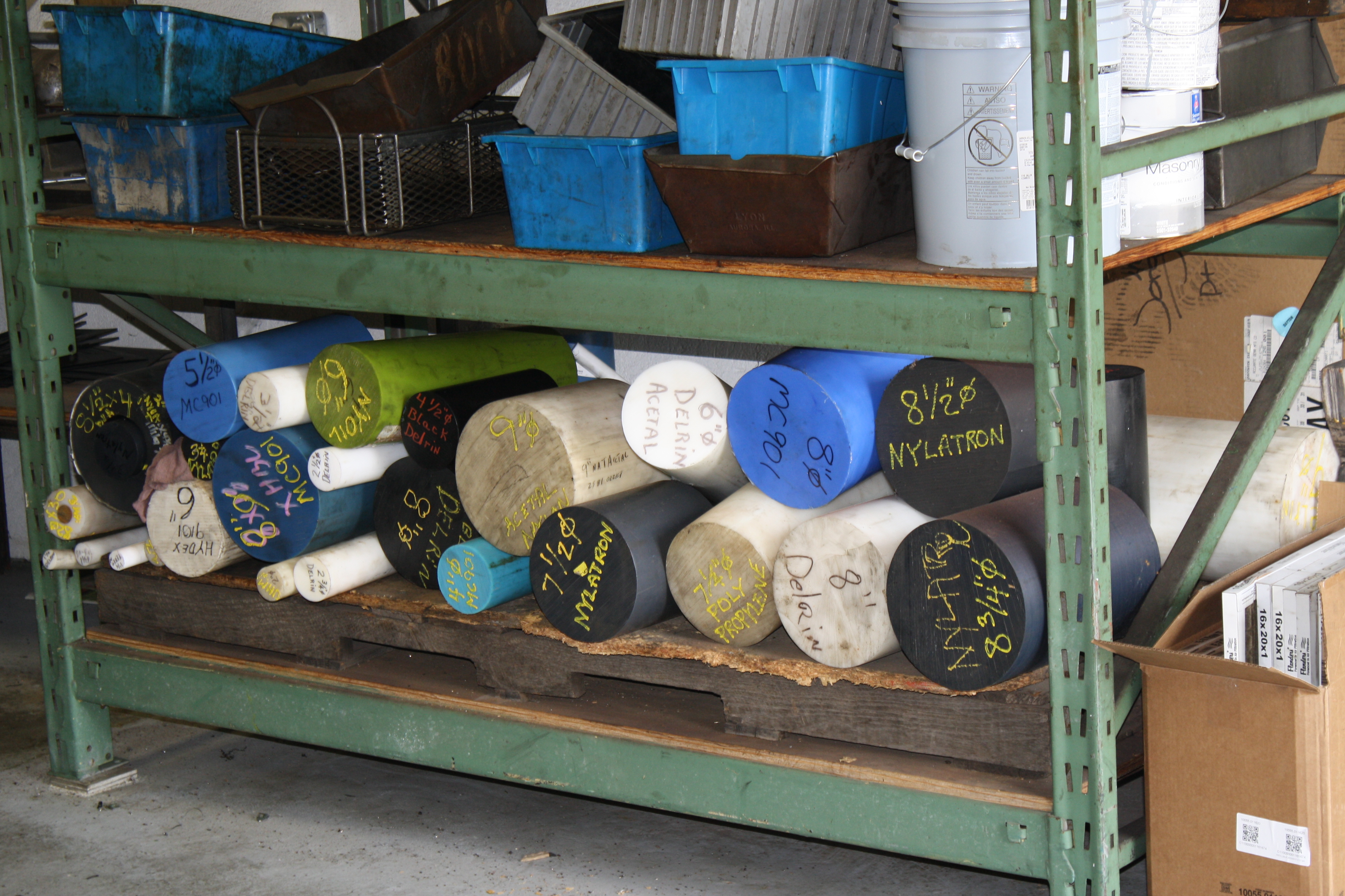 Raw material stock on warehouse shelving